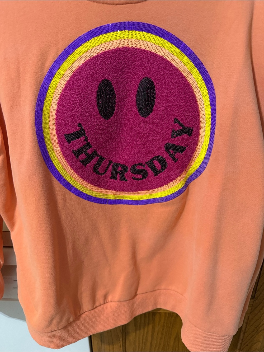 QUEEN OF SPARKLES Peach Crewneck Sweatshirt with Smiley Patch - Picture 2 of 3
